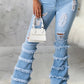 Plus Size Denim Tassel Hem Hole Tiered Jeans