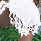Plus Size Denim Tassel Hem Pocket Shorts