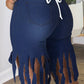 Plus Size Denim Tassel Hem Pocket Shorts